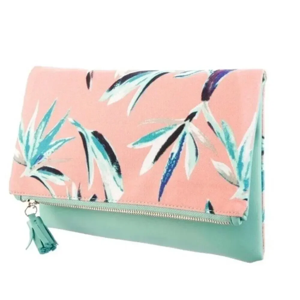 Rachel Pally canvas clutch trimmed in leather.